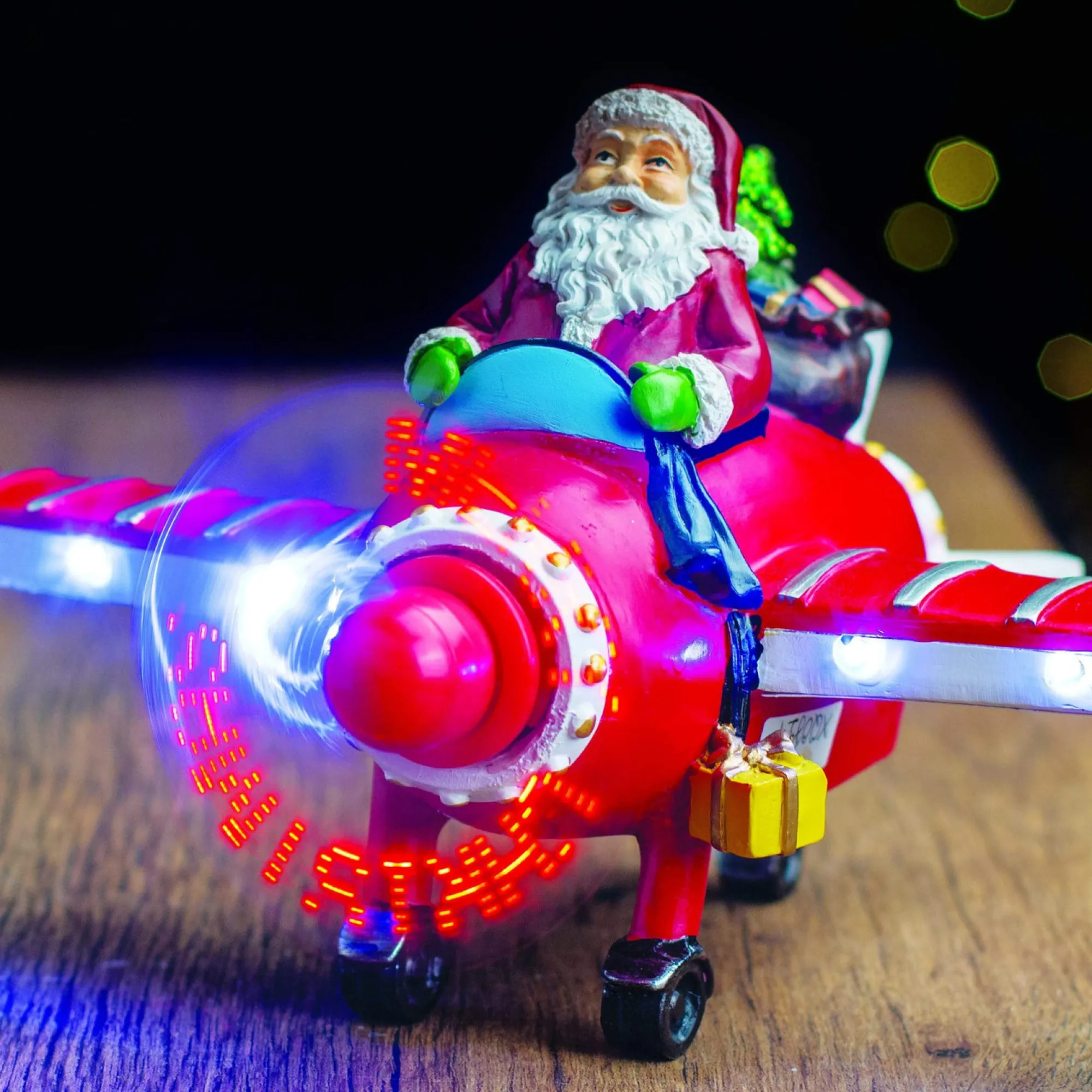 3D & 2D Displays>Christmas World Led Ceramic Santa In Plane Propellor